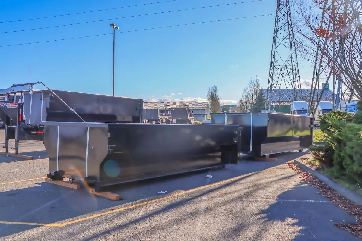 Roll-off dumpster ready for waste disposal at job site for 3 Yard Dumpster Rental in Sunrise Manor
